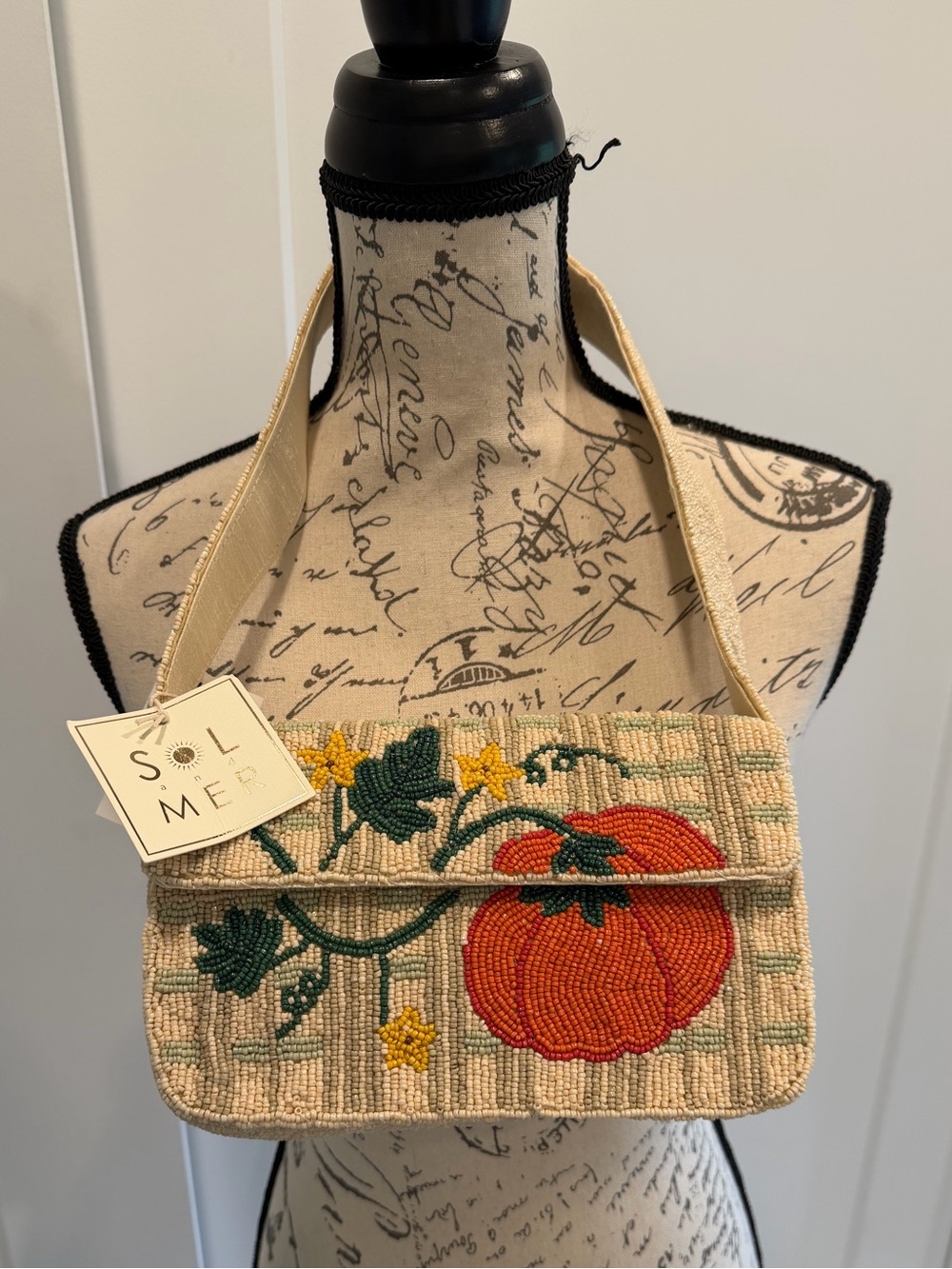 Sol Mere Beige Beaded Shoulder Bag with Orange Pumpkin Motif